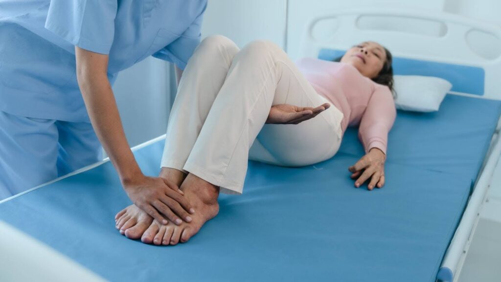 Heel spur specialist at Centurion Orthopaedic Centre diagnosing a patient with heel pain